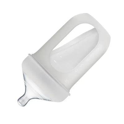 Light gray Tomy Boon silicone bottle, 8 oz, featuring an ergonomic design and a clear silicone body with a narrow spout.