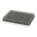 Boon LAWN Drying Rack in white with numerous gray spikes for holding items securely while drying.
