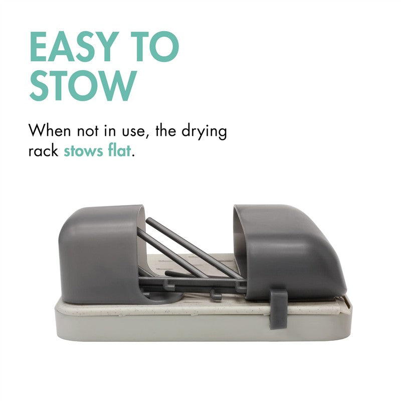 Customizable vertical drying rack in a compact design, featuring gray components and a message about easy storage.