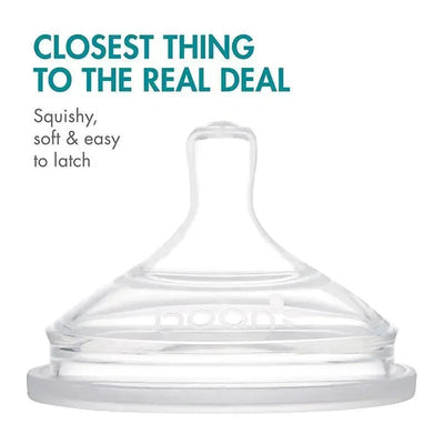 Silicone nipple designed for feeding with a squishy, soft texture and easy latching; includes phrases about its realism.