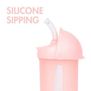 Boon SWIG Silicone Straw Cup in pink, 9 oz, featuring a transparent measuring scale and a flexible silicone straw.