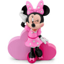 Minnie Mouse figurine from Disney, wearing a pink polka-dot dress and bow, posing beside a pink heart-shaped base.