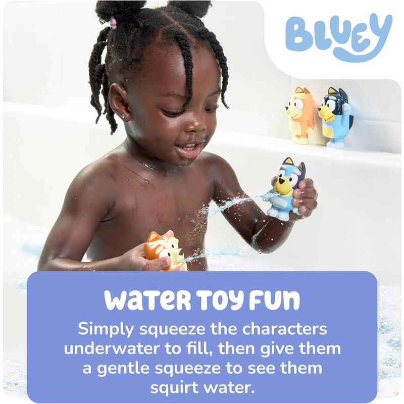 A child plays with Toomies Bluey bath toy squirters in a bathtub, squeezing them to make them squirt water.