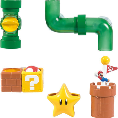 Toomies My Mario Bath Pipes Playset featuring green pipes, a Mario figure, a star, and interactive blocks for water play.