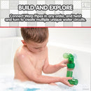 Child playing with Toomies My Mario Bath Pipes Playset, connecting green warp pipes in a bubble-filled bath.