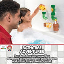 Child playing in a bath with Toomies My Mario Bath Pipes Playset, featuring green pipes and splashing water.