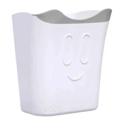 Ubbi bath rinse cup for babies and toddlers, featuring a smiling face design and a curved lip for easy pouring.