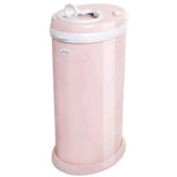 Steel odor-locking diaper pail in blush pink with a white lid and a top opening for disposal.