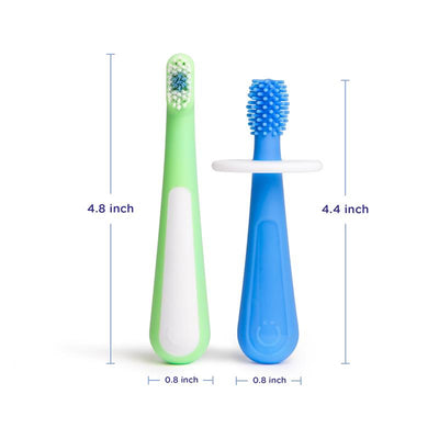 Two toddler toothbrushes, one green and one blue, displayed with length measurements (4.8 inches and 4.4 inches).
