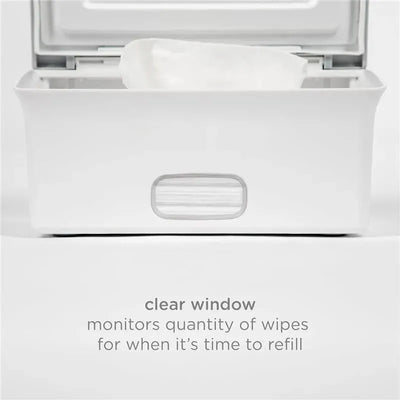 Ubbi taupe wipes dispenser features a clear window for monitoring wipe quantity and a secure seal.