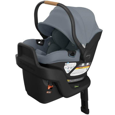 Lightweight Uppababy Aria V2 infant car seat in Callum/Dillan color with a stone blue canopy and safety labels.