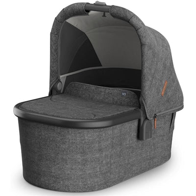 UPPAbaby Bassinet V3 in Charcoal Mélange with a carbon frame, designed to be compatible with Vista, Cruz, Ridge, and Minu strollers.