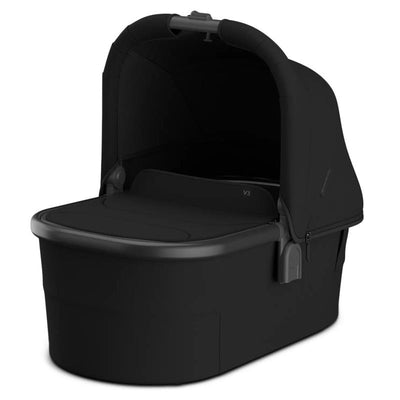 Uppababy Bassinet V3 in black with a carbon frame and black leather accents, featuring a sleek, modern design.