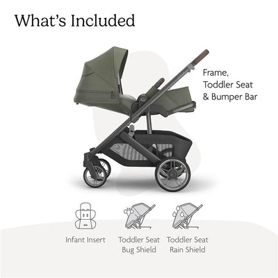 Uppababy Cruz V3 stroller in Meadow Green with graphite frame and chestnut leather handle, includes frame, toddler seat, and bumper bar.