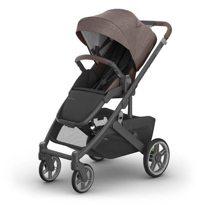 Uppababy Cruz V3 stroller in Mocha Mélange with a carbon frame and chestnut leather accents, showcasing its stylish design.