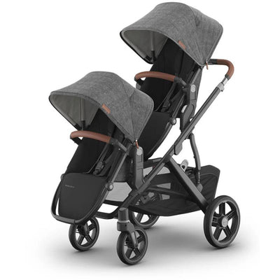 Greyson Vista V3 stroller with Rumbleseat and upper adapters, featuring two seats, adjustable canopies, and a dark frame.