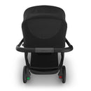 Uppababy Kona Stroller & Bassinet V3 Bundle in black, featuring a sleek design and adjustable handlebar.