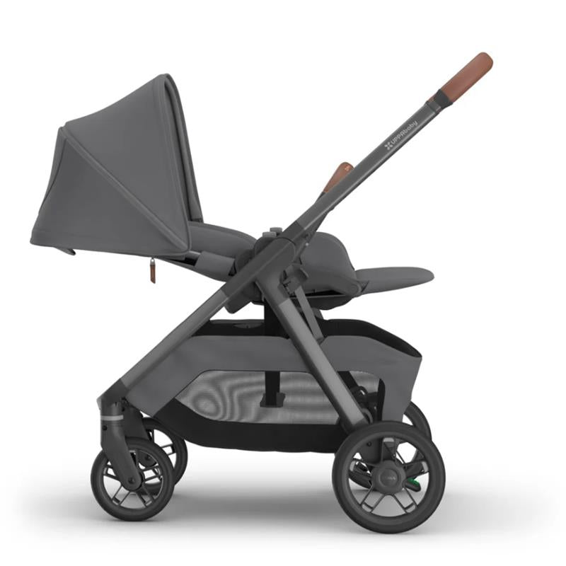 Uppababy Kona Stroller & Bassinet V3 Bundle in Rowan (Graphite) with a dark gray design and leatherette handle.