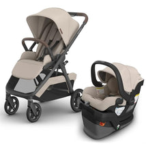 Uppababy Kona Stroller in sandstone mélange with a Mesa V3 infant car seat, both featuring a neutral color scheme and smooth design.