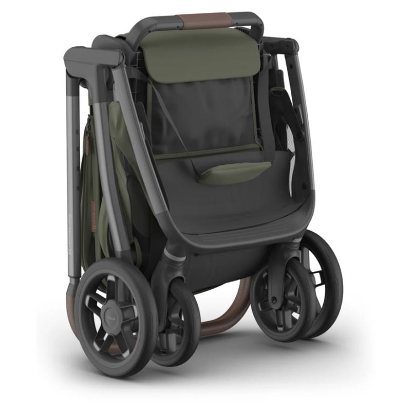 Uppababy Kona Stroller in Meadow Green, featuring a folded design with a spacious seat, adjustable handle, and sleek wheels.