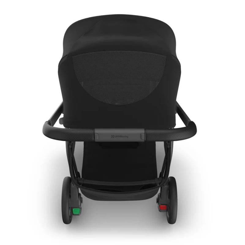 Uppababy Kona Stroller in black, featuring a spacious canopy, mesh back, and easy maneuverability with dual-colored wheels.