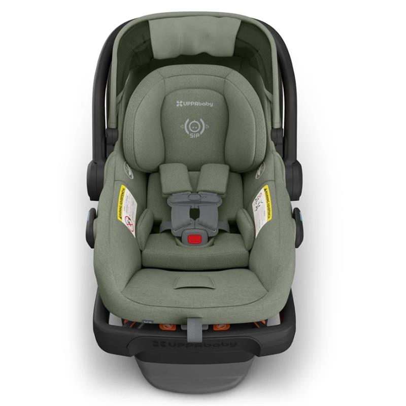 Uppababy Mesa V3 Infant Car Seat in Meadow Green with a padded interior, safety harness, and removable canopy.