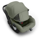 Uppababy Mesa V3 Infant Car Seat in Meadow Green, featuring a protective canopy and comfortable seating.