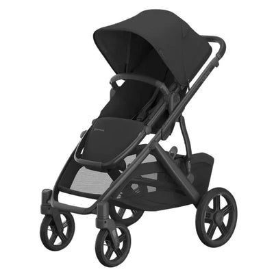 Uppababy Vista V3 stroller in charcoal, featuring a carbon frame and black leather accents, with a spacious undercarriage.