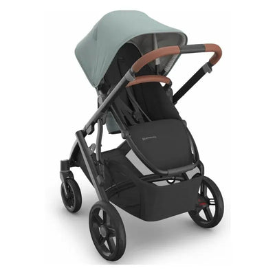 Uppababy Vista V3 Stroller in Mystic Aqua with a carbon frame and saddle leather accents, featuring a sleek design and adjustable canopy.