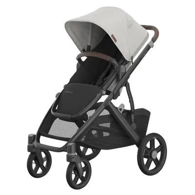 Uppababy Vista V3 stroller in Savannah, featuring a pearl gray jacquard canopy, carbon frame, and chestnut leather handle.