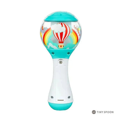 Vulli Shake Shake Sophie features a colorful hot air balloon design within a clear dome, designed as a playful rattle.