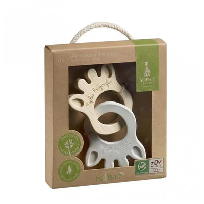 Set of two baby teething rings featuring a natural wooden design and a soft rubber grip, packaged in a recyclable box.
