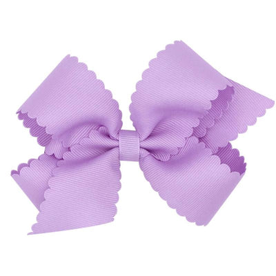 Classic light orchid grosgrain hair bow with scalloped edges, medium size.