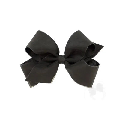 Medium black organza and grosgrain overlay hair bow featuring a prominent, layered design with a central knot.