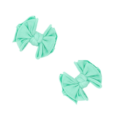 Two mint green fabric hair bow clips by Baby Bling Bows