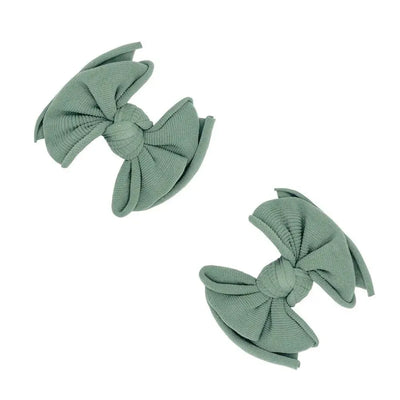 Two sage green ribbed fabric hair bow clips by Baby Bling Bows