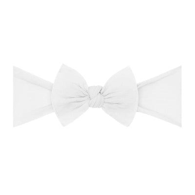 White ITTY BITTY KNOT baby headband bow by Baby Bling Bows